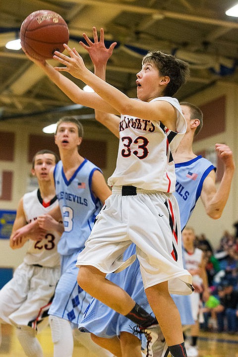 &lt;p&gt;Lakeside&#146;s Takoda Abrahamson leaps upward to score in the first quarter against Dietrich High.&lt;/p&gt;