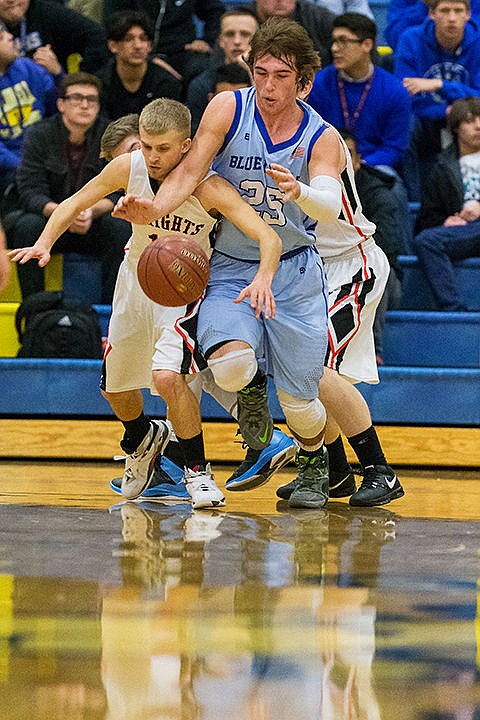 &lt;p&gt;Lakeside High School&#146;s Hunter Kolar fights for position over Dietrich High&#146;s Austin Fenstermaker for possession of a loose ball in the first quarter of the state 1A Division II state basketball tournament Thursday at Caldwell High School.&lt;/p&gt;