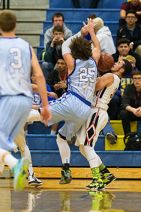 &lt;p&gt;Lakeside High&#146;s Jordan Nilson collides with Dietrich&#146;s Austin Fenstermaker during the second quarter in Caldwell.&lt;/p&gt;