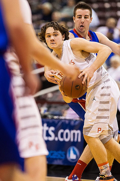 &lt;p&gt;Post Falls High&#146;s Max McCullough makes a move on Nampa&#146;s Riley Brown before passing the ball in the second quarter.&lt;/p&gt;