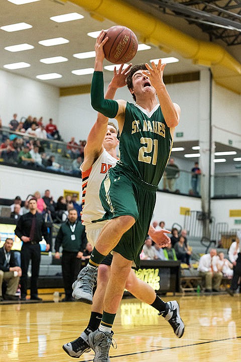 &lt;p&gt;St. Maries&#146; Jacob Greer is fouled by Delco&#146;s Stegan Garner while driving to the basket in the second half.&lt;/p&gt;