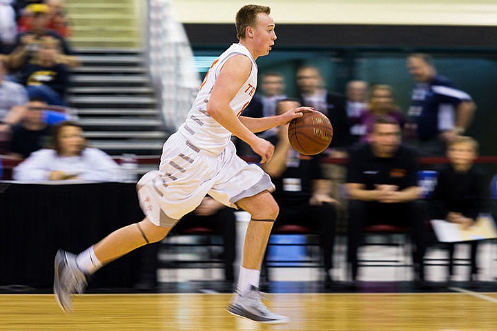 &lt;p&gt;Post Falls guard Luke Anderson races up the court in third quarter in Nampa.&lt;/p&gt;