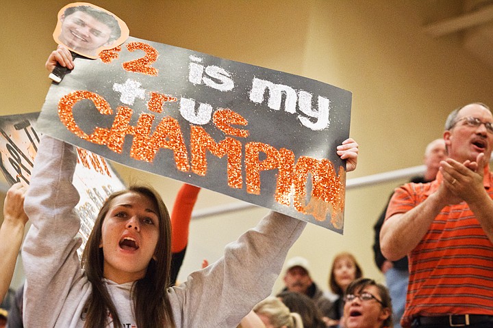 SHAWN GUST/Press

Post Falls High senior Nichole Namen cheers for the boys basketball team at Columbia High in Nampa.