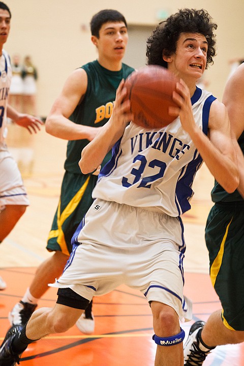 SHAWN GUST/Press

Andrew Baracco eyes the hoop before going up for a lay-in Saturday at Columbia High.