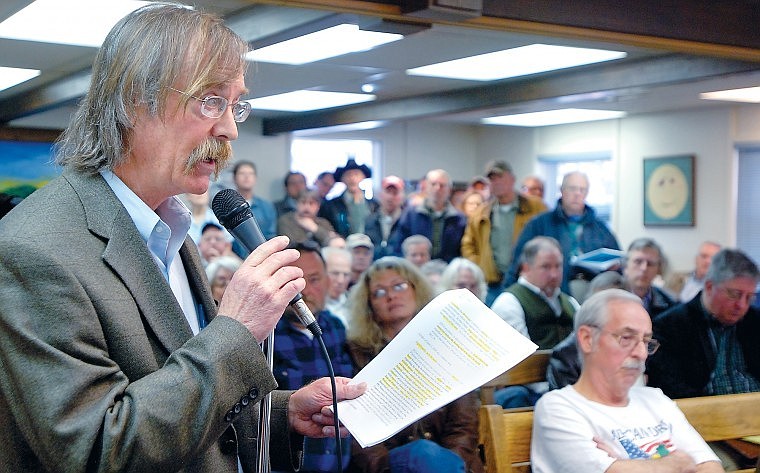 Roger Sullivan addresses Flathead County Commissioners during a public hearing Monday morning regarding a $1 million settlement with developers of the North Shore Ranch Development near Flathead Lake.