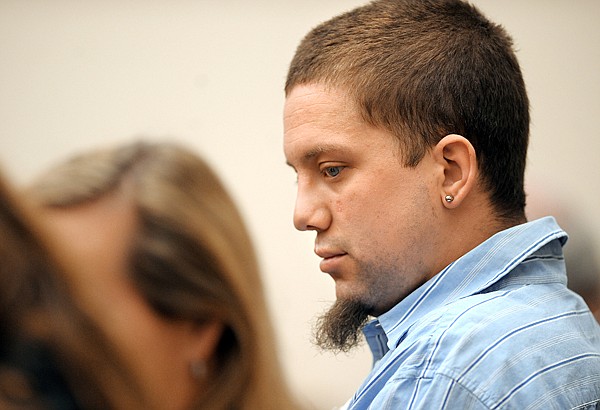 Tyrone J. Stallcup, 27, of Columbia Falls, waits for his arraignment to begin on Thursday morning at the Justice Center in Kalispell. Stallcup entered a plea of not guilty to vehicular homicide while under the influence and criminal endangerment.