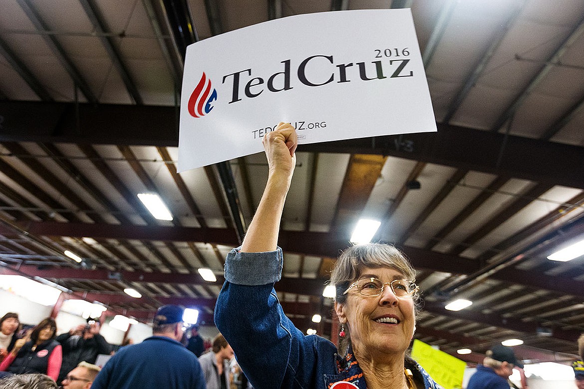&lt;p&gt;SHAWN GUST/Press Joyce Swoboda-Saunders, of Coeur d&#146;Alene, raises a campaign sign in support of Ted Cruz for president.&lt;/p&gt;