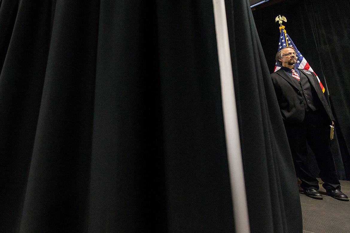 &lt;p&gt;SHAWN GUST/Press Pastor Tim Remington waits in a corner of the stage to be announced prior to leading a prayer.&lt;/p&gt;