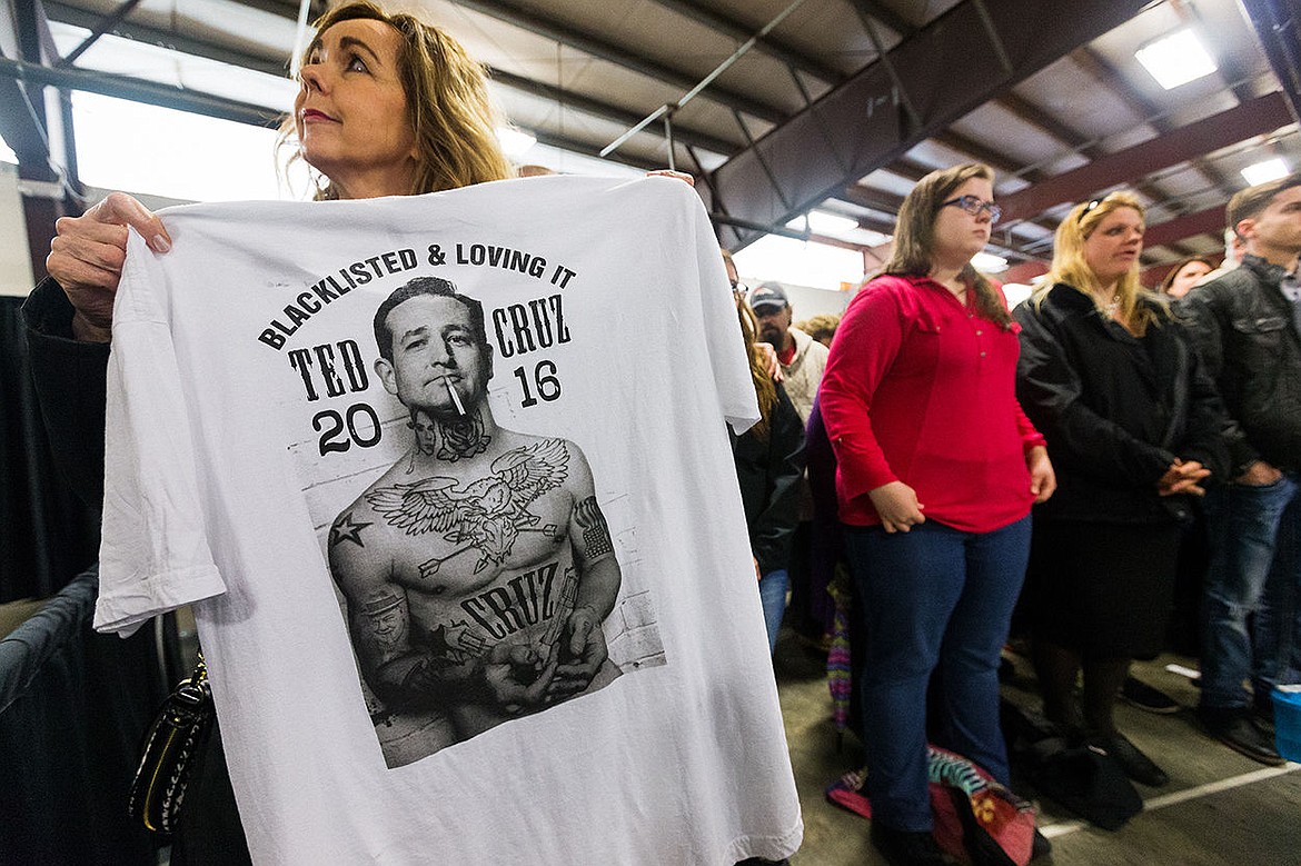 &lt;p&gt;SHAWN GUST/Press Valerie Block holds up a t-shirt she bought online during the opening remarks at the rally.&lt;/p&gt;