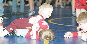 &lt;p&gt;Troy Peewee wrestler Lukas Fritts, 4, takes on Kalispell's Patrick Sullivan 5, at the 2012 Kootenai Klassic Little Guy Wrestling Tourney Saturday.&lt;/p&gt;