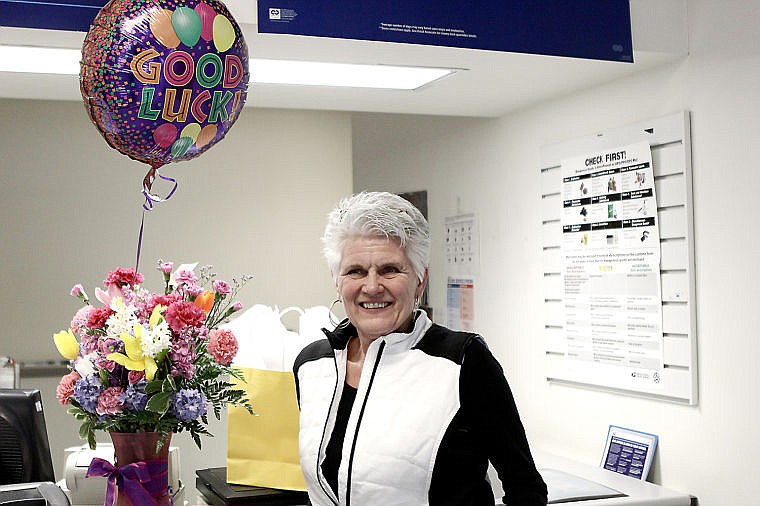 &lt;p&gt;Paula Mintz stands next to her flowers and gifts at the Superior Post Office, where she worked as a clerk for 15 years.&lt;/p&gt;