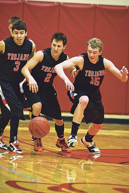 &lt;p&gt;From left, Damon Gonzalez, Kyle English and Luke Thoreson scramble to take possession of a loose ball in the second half.&lt;/p&gt;