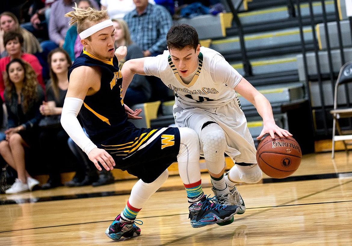 &lt;p&gt;JAKE PARRISH/Press St. Maries guard Jake Sieler is tripped up by Wendell guard Josh Rocha at the 2A state third place game on Saturday at Capital High School in Boise, Idaho.&lt;/p&gt;