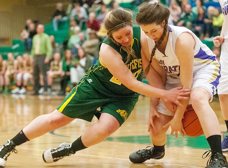 &lt;p&gt;Whitefish senior guard Simone Craft (left) and Polson sophomore post Nicole Lake fight for a loose ball Thursday night during the Northwestern A Divisional tournament at Glacier High School. Feb. 27, 2014 in Kalispell, Montana. (Patrick Cote/Daily Inter Lake)&lt;/p&gt;