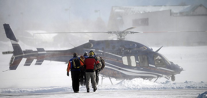 &lt;p&gt;Brian Heino, Search and Rescue Coordinator with the Flathead County Sheriff's Office takes volunteers from North Valley and Flathead County SAR on a training run with Two Bear Air on Saturday, March 1, at the Kalispell City Airport. &quot;We are working on familiarizing ourselves with the new helicopters,&quot; said Heino. &quot;The goal is to utilize the equipment to help the dedicated volunteers respond even faster.&quot; Chief Pilot Jim Bob Pierce can be seen giving the thumbs up to approach the helicopter. (Brenda Ahearn/Daily Inter Lake)&lt;/p&gt;