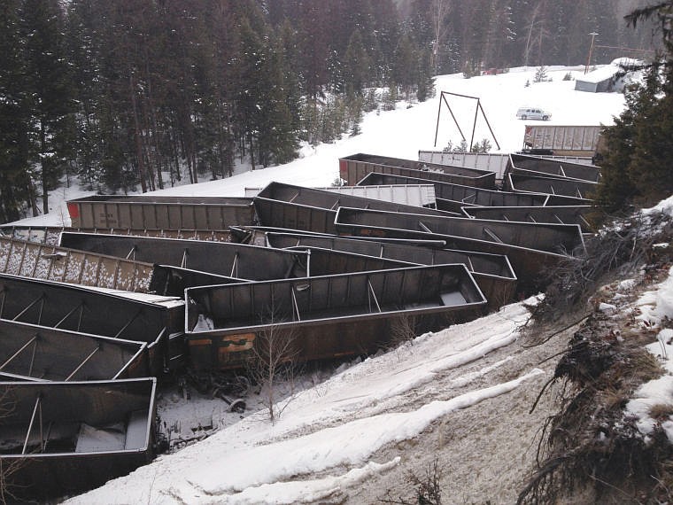 &lt;p&gt;Derailed coal cars lie in a jumbled heap alongside the railroad tracks just outside of Olney Saturday afternoon after 45 cars of a train heading east from British Columbia derailed.&lt;/p&gt;