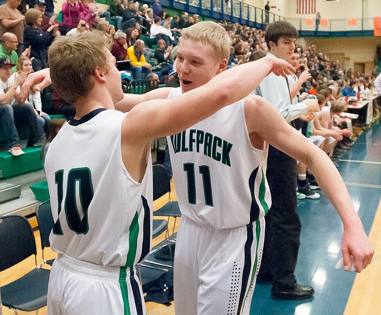 &lt;p&gt;Glacier senior guard Evan Epperly (10) and Glacier senior wing Bryan Michaels (11) celebrate Friday night during the second half of Glacier's victory over Flathead at Glacier High School. March 7, 2014 in Kalispell, Montana. (Patrick Cote/Daily Inter Lake)&lt;/p&gt;