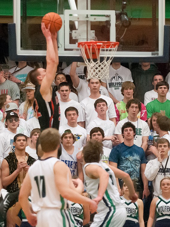 &lt;p&gt;Flathead senior Matt Quist (52) goes up for an alley-oop dunk Friday night during the first half of Glacier's victory over Flathead at Glacier High School. March 7, 2014 in Kalispell, Montana. (Patrick Cote/Daily Inter Lake)&lt;/p&gt;