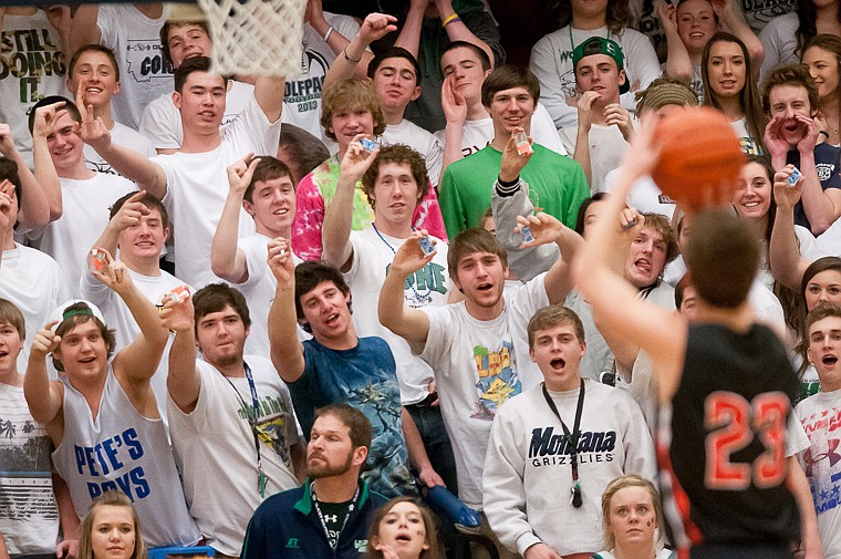 &lt;p&gt;Glacier students try to distract Flathead senior Chandler Escalante (23) while he shoots a free throw Friday night during the first half of Glacier's victory over Flathead at Glacier High School. March 7, 2014 in Kalispell, Montana. (Patrick Cote/Daily Inter Lake)&lt;/p&gt;