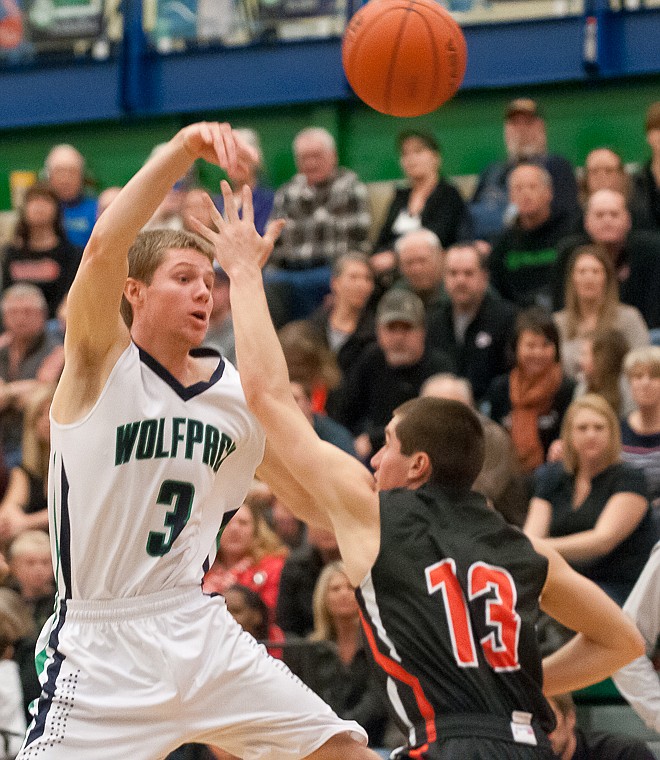 &lt;p&gt;Glacier junior wing Sam McCamley (3) pass the ball Friday night during the first half of Glacier's victory over Flathead at Glacier High School. March 7, 2014 in Kalispell, Montana. (Patrick Cote/Daily Inter Lake)&lt;/p&gt;