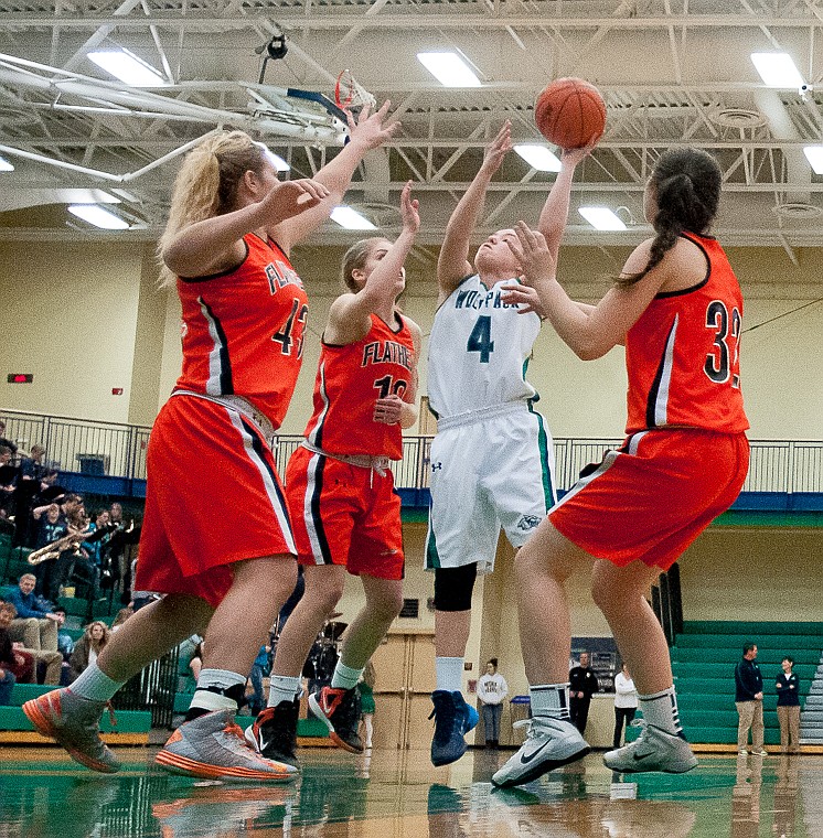 &lt;p&gt;Glacier sophomore guard Hailee Bennett (4) puts up a shot Friday night during the first of half of Glacier's matchup against Flathead at Glacier High School. March 7, 2014 in Kalispell, Montana. (Patrick Cote/Daily Inter Lake)&lt;/p&gt;