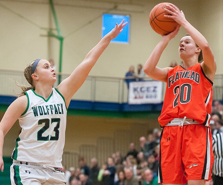 &lt;p&gt;Flathead senior Montana Fountain (20) shoots over Glacier sophomore guard Katie Thomas (23) Friday night during the first of half of Glacier's matchup against Flathead at Glacier High School. March 7, 2014 in Kalispell, Montana. (Patrick Cote/Daily Inter Lake)&lt;/p&gt;