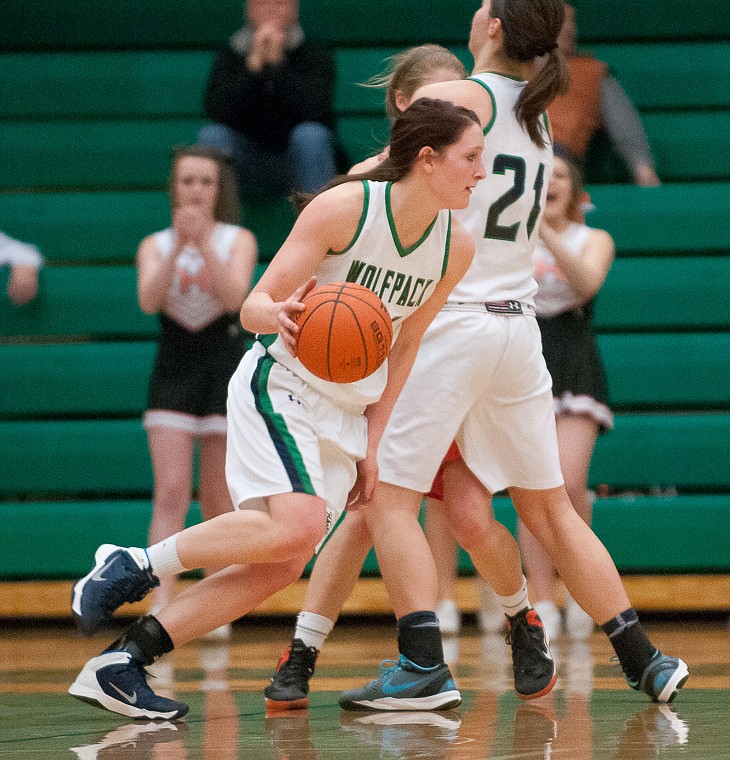 &lt;p&gt;Glacier junior forward Katie Wiley (24) drives the ball around a screen set by Glacier senior center Cassi Hashley (21) Friday night during the first of half of Glacier's matchup against Flathead at Glacier High School. March 7, 2014 in Kalispell, Montana. (Patrick Cote/Daily Inter Lake)&lt;/p&gt;