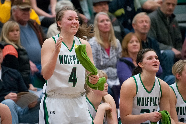 &lt;p&gt;Glacier sophomore guard Hailee Bennett (4) and Glacier senior center Cassi Hashley (21) celebrate from the bench Friday night during the second of half of Glacier's victory over Flathead at Glacier High School. March 7, 2014 in Kalispell, Montana. (Patrick Cote/Daily Inter Lake)&lt;/p&gt;