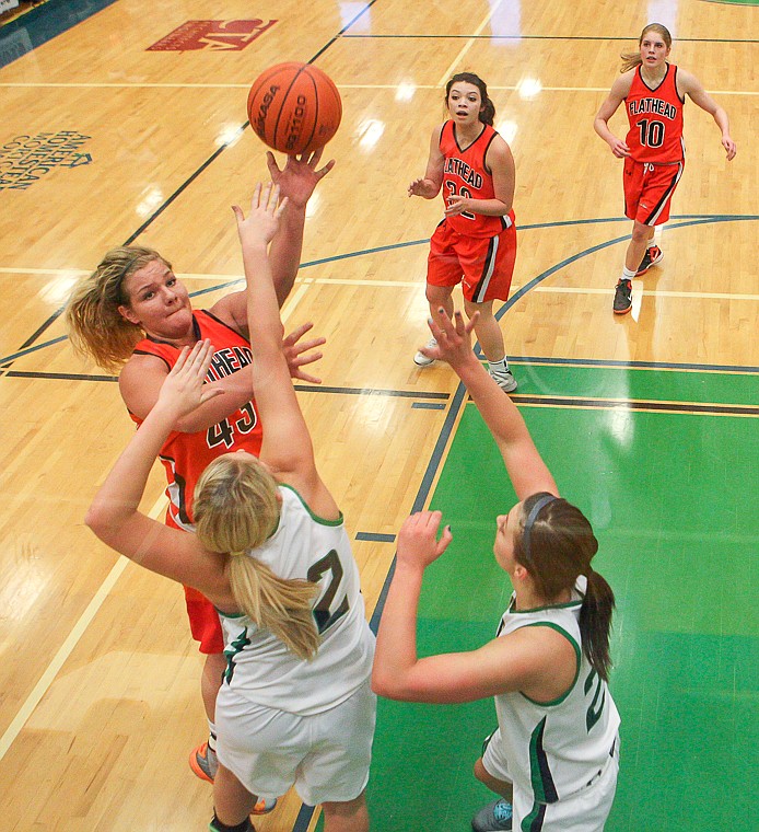 &lt;p&gt;Flathead senior Jenessa Heine (43) puts up a shot Friday night during Glacier's victory over Flathead at Glacier High School. March 7, 2014 in Kalispell, Montana. (Patrick Cote/Daily Inter Lake)&lt;/p&gt;