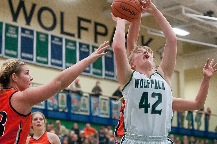 &lt;p&gt;Glacier sophomore forward Ali Williams (42) has her shot blocked from behind Friday night during the second of half of Glacier's victory over Flathead at Glacier High School. March 7, 2014 in Kalispell, Montana. (Patrick Cote/Daily Inter Lake)&lt;/p&gt;