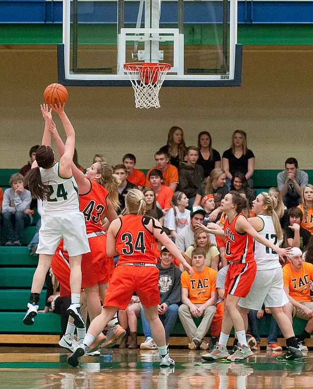 &lt;p&gt;Glacier junior forward Katie Wiley (24) shoots the ball Friday night during the first of half of Glacier's matchup against Flathead at Glacier High School. March 7, 2014 in Kalispell, Montana. (Patrick Cote/Daily Inter Lake)&lt;/p&gt;