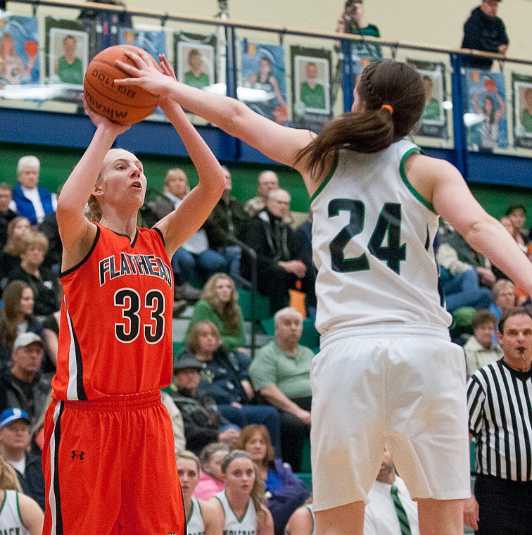 &lt;p&gt;Glacier junior forward Katie Wiley (24) blocks the shot of Flathead freshman Tiana Johnson (33) Friday night during the first of half of Glacier's matchup against Flathead at Glacier High School. March 7, 2014 in Kalispell, Montana. (Patrick Cote/Daily Inter Lake)&lt;/p&gt;