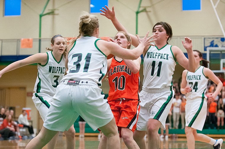 &lt;p&gt;Flathead senior Emma Andrews (10) looks to shoot Friday night during the first of half of Glacier's matchup against Flathead at Glacier High School. March 7, 2014 in Kalispell, Montana. (Patrick Cote/Daily Inter Lake)&lt;/p&gt;