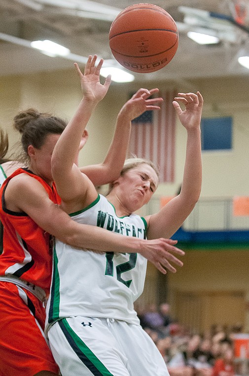 &lt;p&gt;Glacier senior forward Hannah Atlee (12) takes an elbow to the head Friday night during the second of half of Glacier's victory over Flathead at Glacier High School. March 7, 2014 in Kalispell, Montana. (Patrick Cote/Daily Inter Lake)&lt;/p&gt;