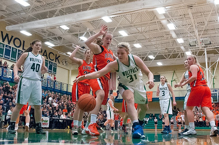 &lt;p&gt;Glacier junior forward Birelle Bumgarner (31) goes for a loose ball Friday night during the second of half of Glacier's victory over Flathead at Glacier High School. March 7, 2014 in Kalispell, Montana. (Patrick Cote/Daily Inter Lake)&lt;/p&gt;