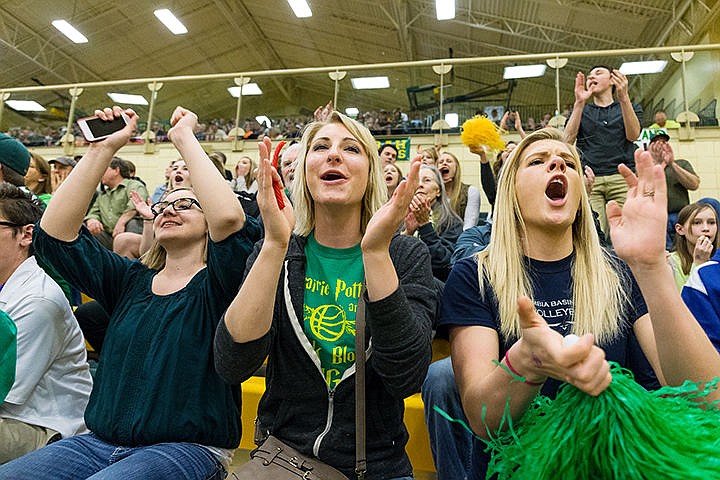 &lt;p&gt;Lakeland supporters McKenna Young, left, Kaitlyn Whitesitt, center, and Maddi Ray, whose younger brother plays for the Hawks, cheer for their team in the second half.&lt;/p&gt;