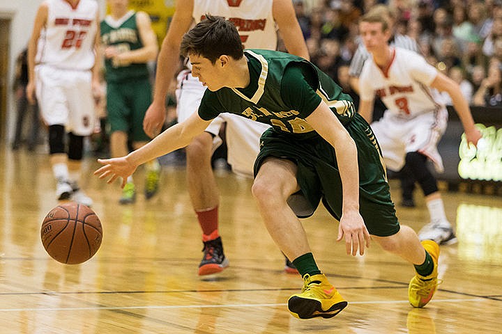 &lt;p&gt;St. Maries High&#146;s Jake Sieler reaches to control a loose ball in the first half.&lt;/p&gt;