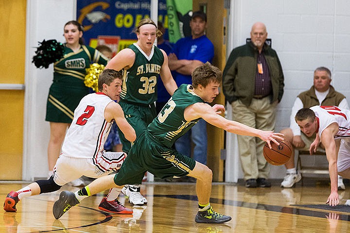 &lt;p&gt;Keifer Gibson, of St. Maries, races for the ball after stealing it from Soda Springs guard Tanner Meyers.&lt;/p&gt;