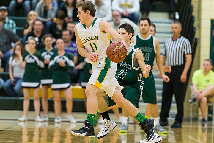 &lt;p&gt;Lakeland High&#146;s Tyrel Derrick (11) dribbles around Burley defender Mackinley Quast (10) during the second quarter at Borah High School.&lt;/p&gt;