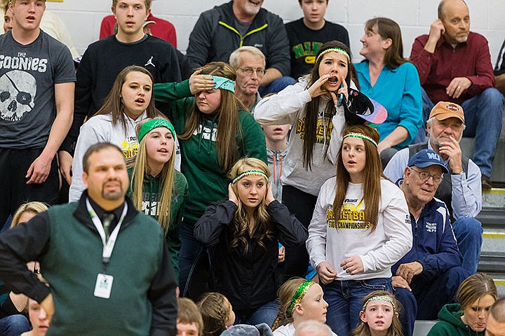 &lt;p&gt;St. Maries students react to a play on the court in the second quarter.&lt;/p&gt;