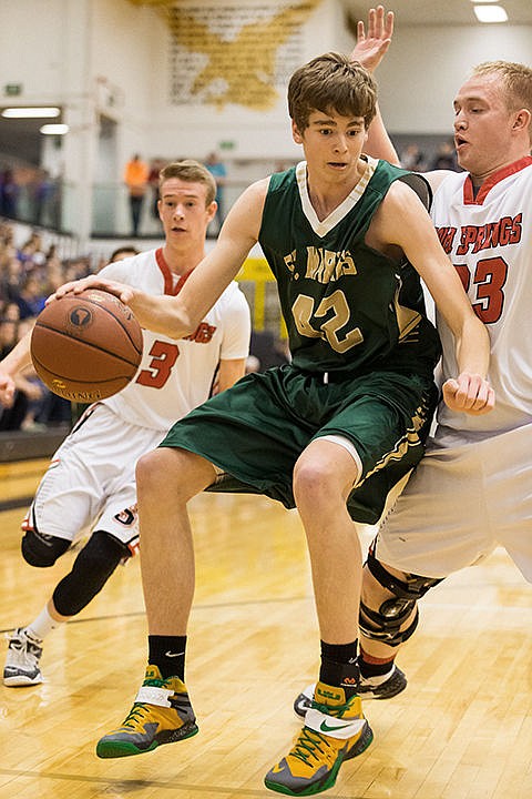 &lt;p&gt;St. Maries High&#146;s AJ Becktel drives around Soda Spring High School&#146;s Kyle Sims during the first half in Boise.&lt;/p&gt;