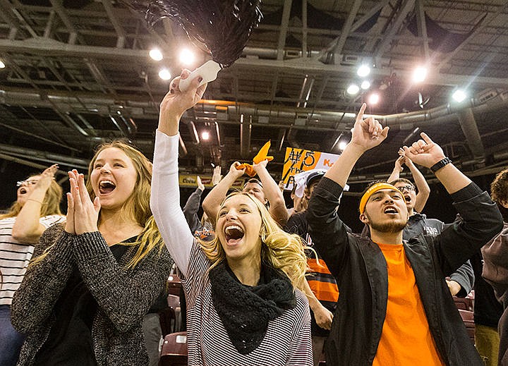 &lt;p&gt;Post Falls High School students Alexis Ferguson, left, Kirsten Rowley and Tyler Keough, far right, cheer for their team Friday during the state 5A boys basketball semi-final game against Capital High at the Idaho Center in Nampa.&lt;/p&gt;