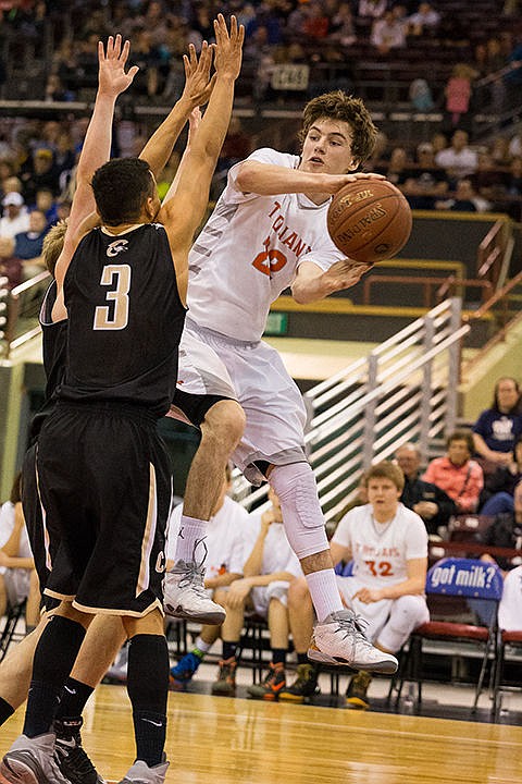 &lt;p&gt;Post Falls&#146; Dalton Thompson leaps into the air to pass the ball for an assist in the second half.&lt;/p&gt;