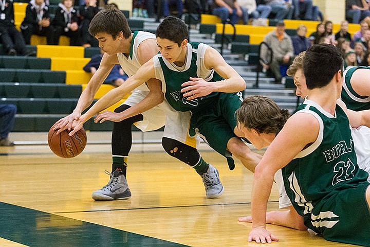 &lt;p&gt;Lakeland High&#146;s Auston Henry scrambles against Burley High&#146;s Mackinley Quast for a loose ball in the first period of the consolation round of the state 4A boys basketball tournament Friday at Borah High School in Boise.&lt;/p&gt;