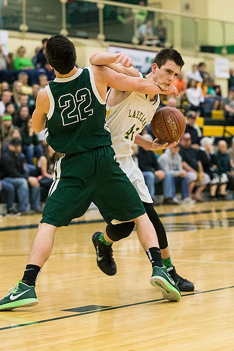 &lt;p&gt;Lakeland&#146;s Slader Ray is blocked by the forearm of Cole Gibbons (22) during the third quarter in Boise.&lt;/p&gt;