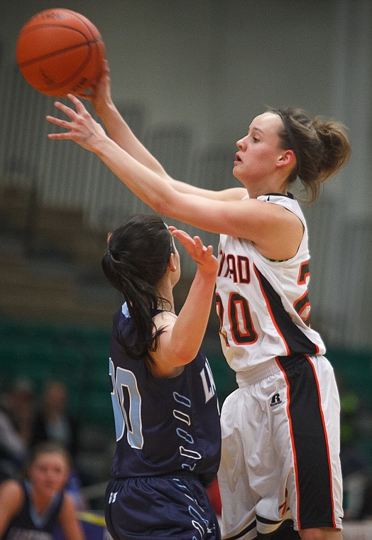 &lt;p&gt;Flathead junior Tana Fountain (20) passes the ball Thursday night during Flathead's matchup against Great Falls High in the first round of the Class AA State Championship in Great Falls. Thursday, March 7, 2013 in Great Falls, Montana. (Patrick Cote/Daily Inter Lake)&lt;/p&gt;