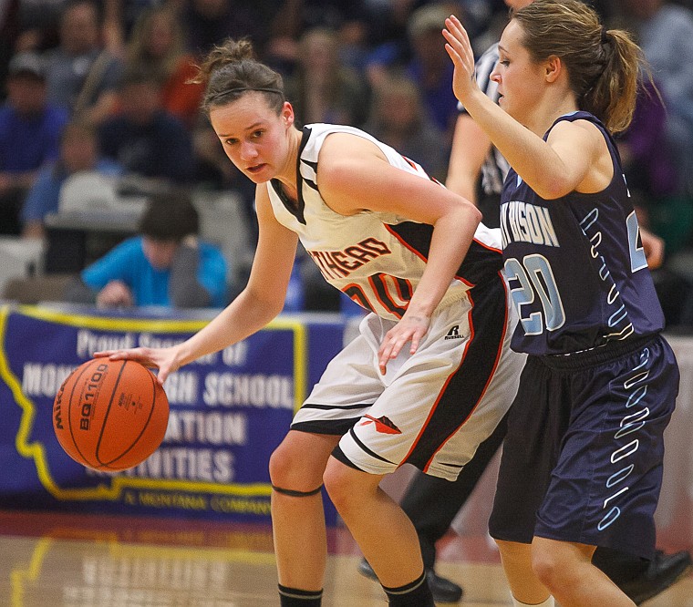 &lt;p&gt;Flathead junior Tana Fountain (20) dribbles around a defender Thursday night during Flathead's matchup against Great Falls High in the first round of the Class AA State Championship in Great Falls. Thursday, March 7, 2013 in Great Falls, Montana. (Patrick Cote/Daily Inter Lake)&lt;/p&gt;