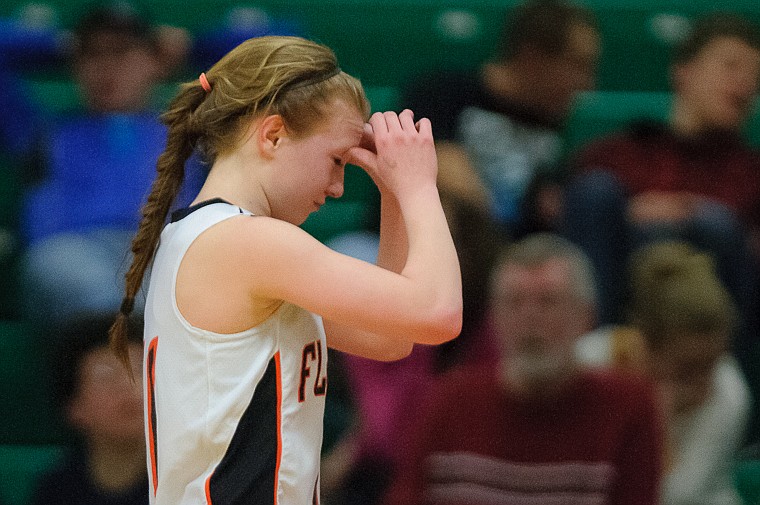 &lt;p&gt;Flathead senior Dani Davis walks off the court Thursday night near the end of Flathead's loss to Great Falls High in the first round of the Class AA state basketball tournament in Great Falls.&#160;&lt;/p&gt;