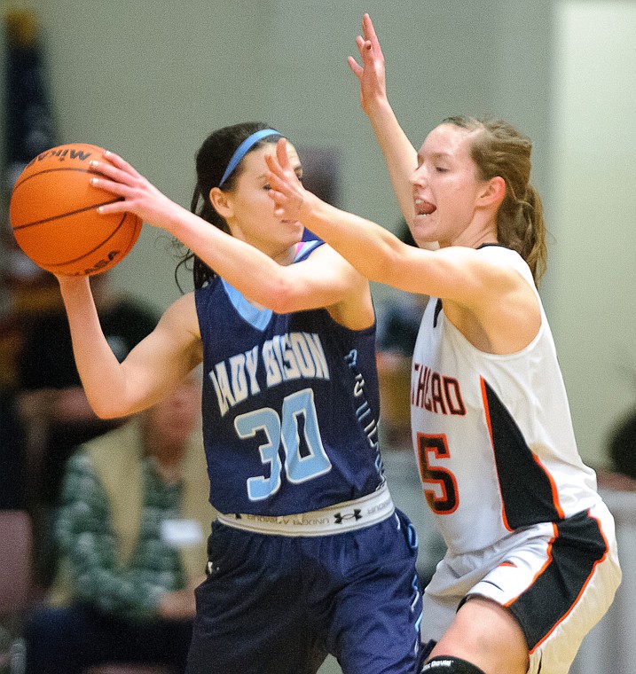 &lt;p&gt;Flathead senior Emily Russell (15) defends a pass Thursday night during Flathead's matchup against Great Falls High in the first round of the Class AA State Championship in Great Falls. Thursday, March 7, 2013 in Great Falls, Montana. (Patrick Cote/Daily Inter Lake)&lt;/p&gt;