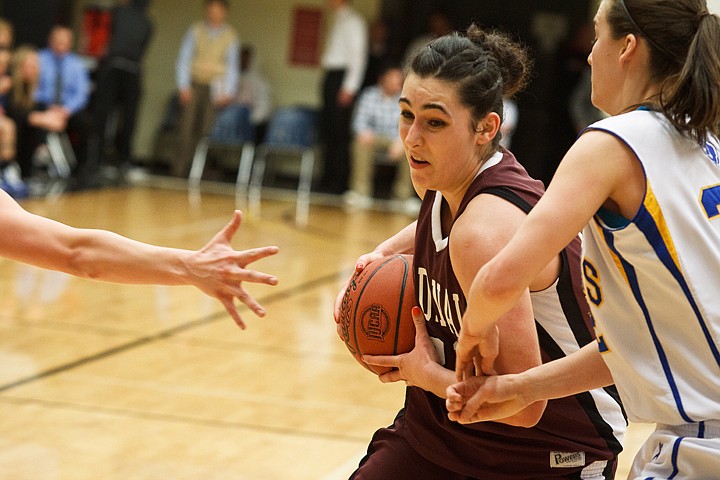 SHAWN GUST/Press

Tugce Canitez powers through a lane for a score in the Region 18 tournament in Twin Falls.